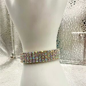 Elegant Silver stretch bracelet with four rows of AB Rhinestones.